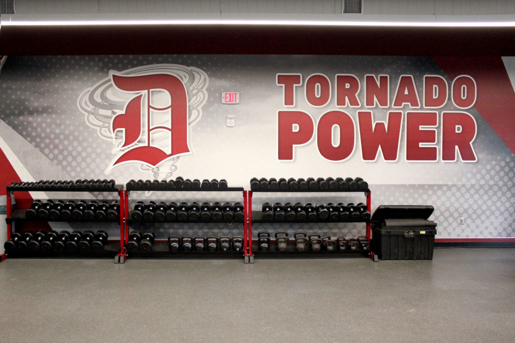 Marlite FRP mural of school logo & tag line, Tornado Power, in Dover High School weight room in Dover, Ohio.